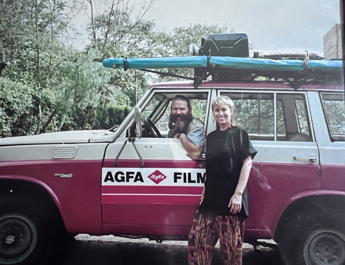 Jan standing beside the old Land Cruiser with AGFA Film livery, Jeremy at the wheel, East Africa 1994