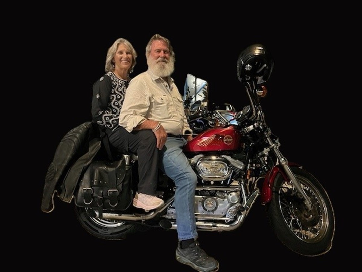 Jan and Jeremy on a Harley-Davidson in retirement